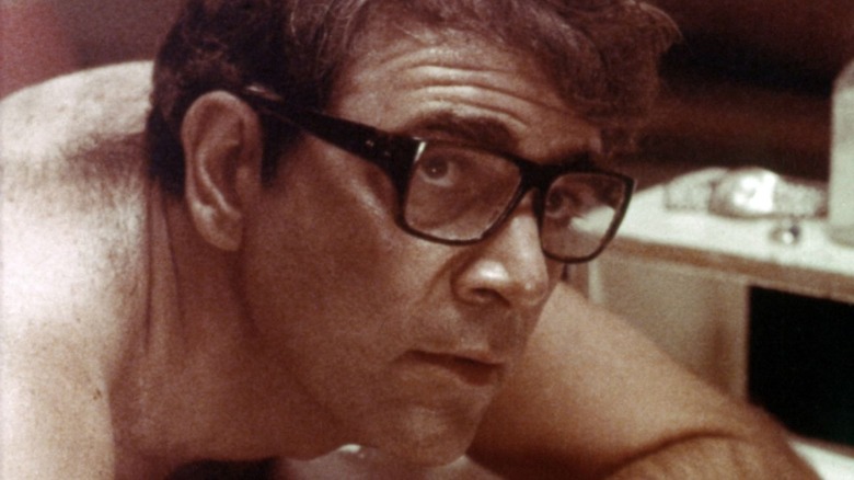 Alex Rocco looks up