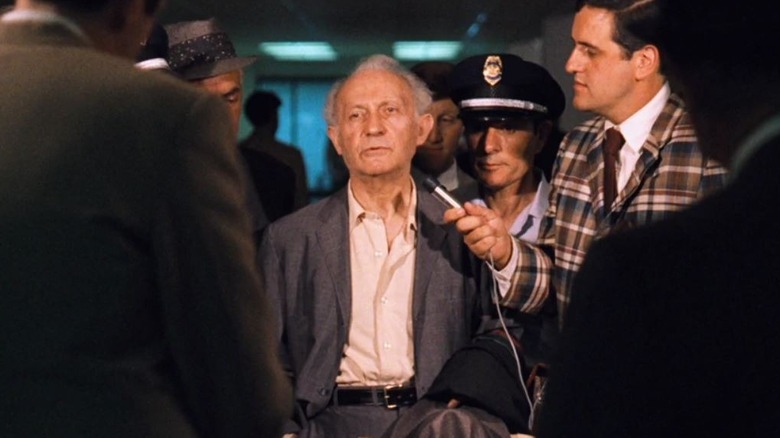 Lee Strasberg arrives at airport