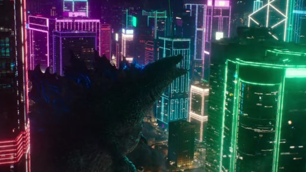 Godzilla stomps through neon city