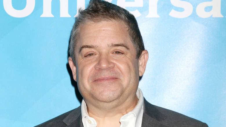 Patton Oswalt smirking