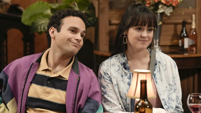 Geoff and Erica sitting at a table at a restaurant 