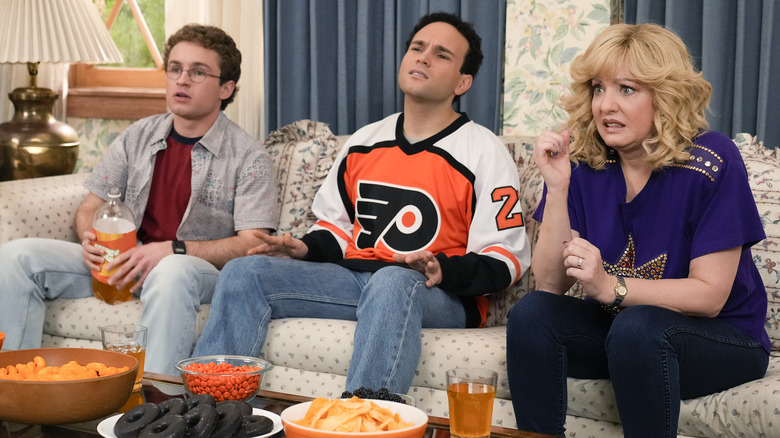 Goldbergs sitting on couch