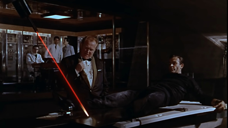 Goldfinger points laser at Bond