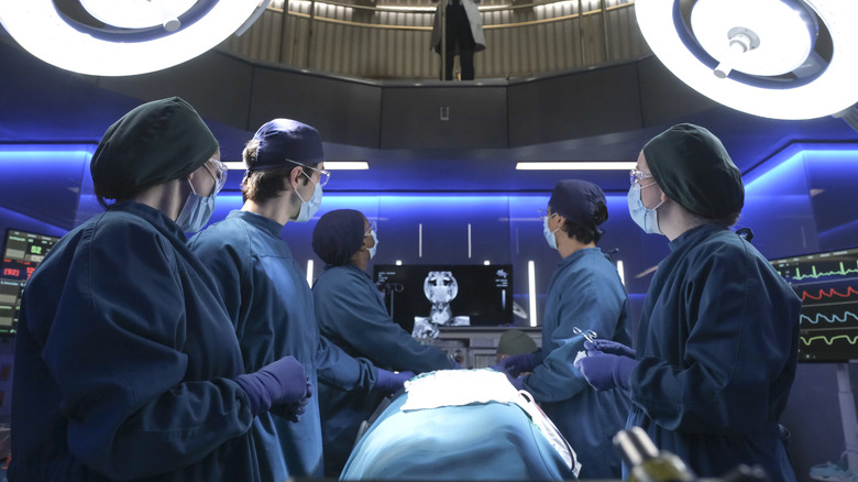 The doctors prepare for surgery