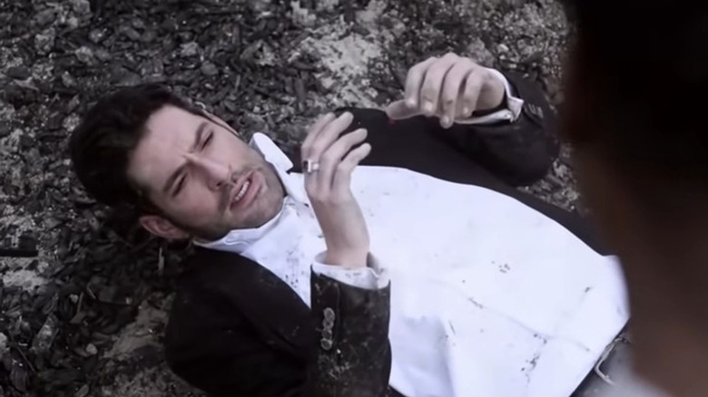 Tom Ellis as Lucifer landing in heaven