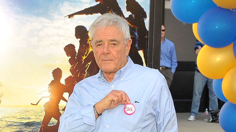 Richard Donner displaying button