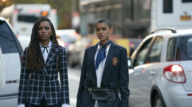 Jordan and Monet walking on a street