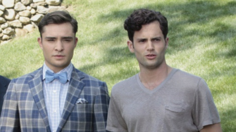 Ed Westwick and Penn Badgley looking concerned.