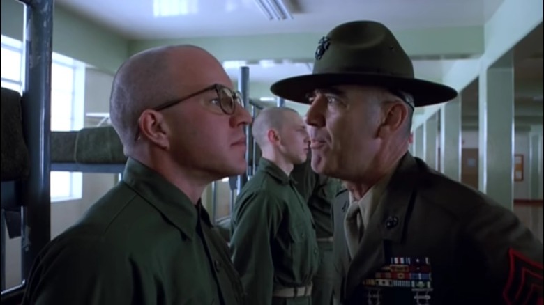 Gunnery Sergeant Hartman inspects new recruits in bunk