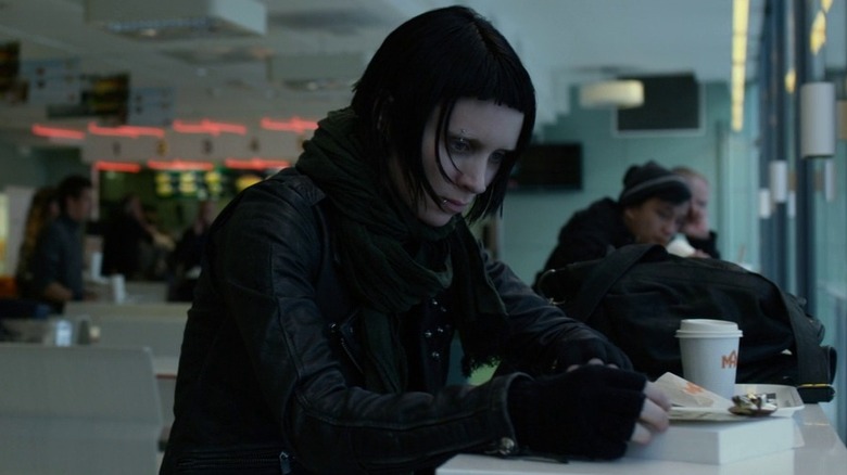 Lisbeth Salander sitting at counter