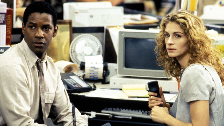 Darby and Gray sitting at desk