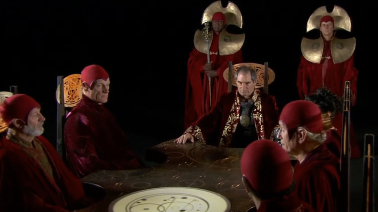 Rassilon and Time Lords at table