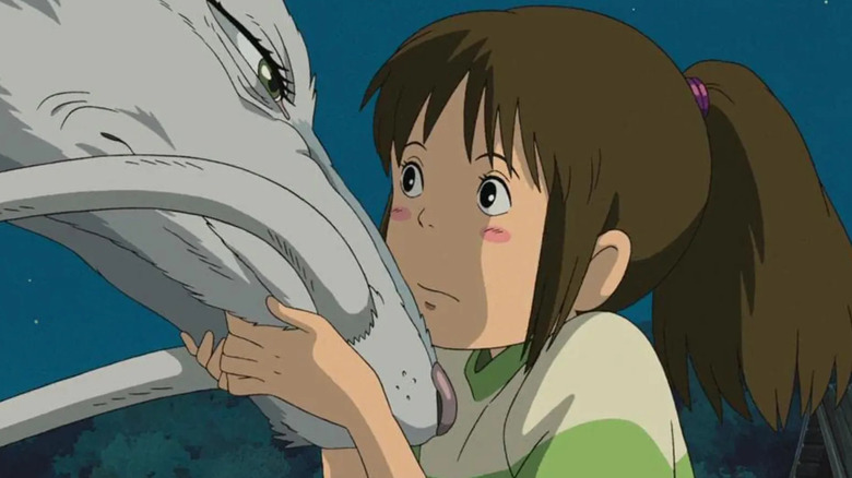 Chihiro hold Haku's head