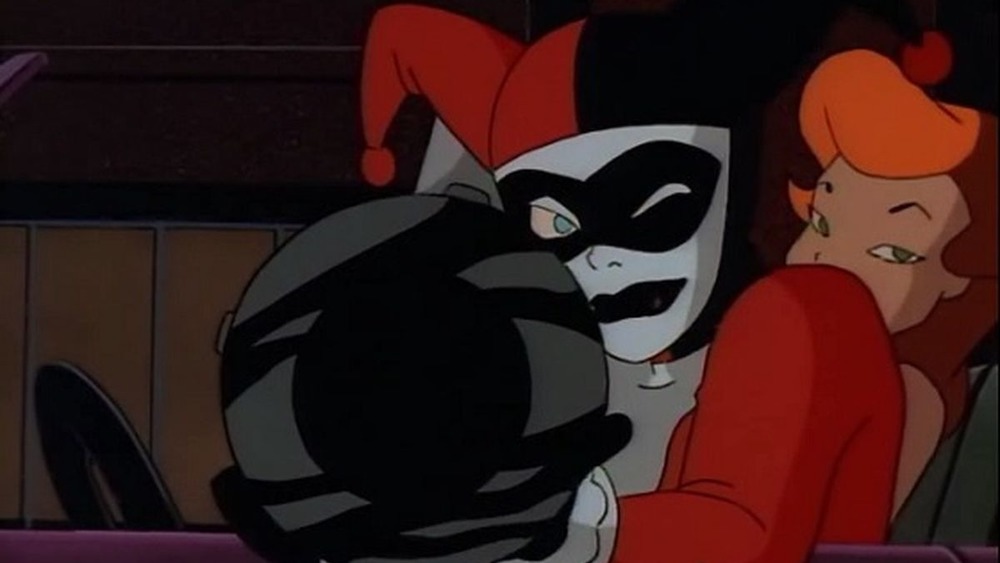 Harley Quinn pointing big gun