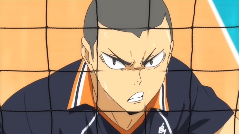 Tanaka looking furious at net
