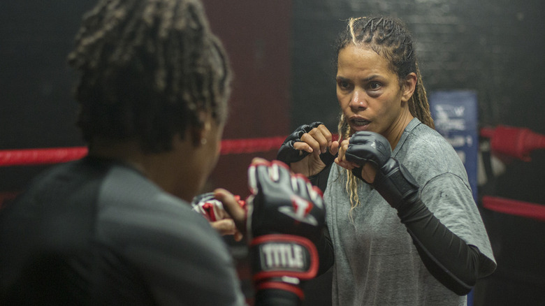 Bruised Halle Berry sparring in boxing ring