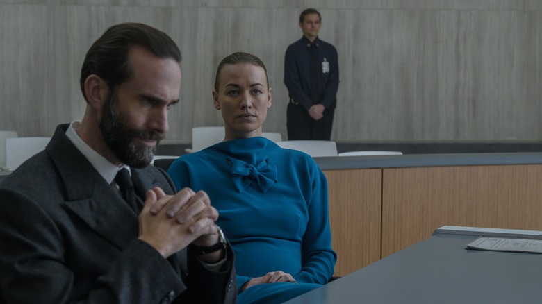 Joseph Fiennes as Commander Fred Waterford and Yvonne Strahovski as Serena Joy Waterford in "The Handmaid's Tale" Season 4.