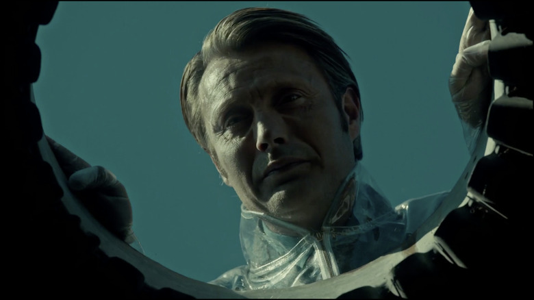 Hannibal wearing a plastic suit