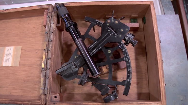 A Navy sextant in a wooden box on Pawn Stars