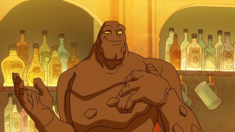 Clayface standing behind bar