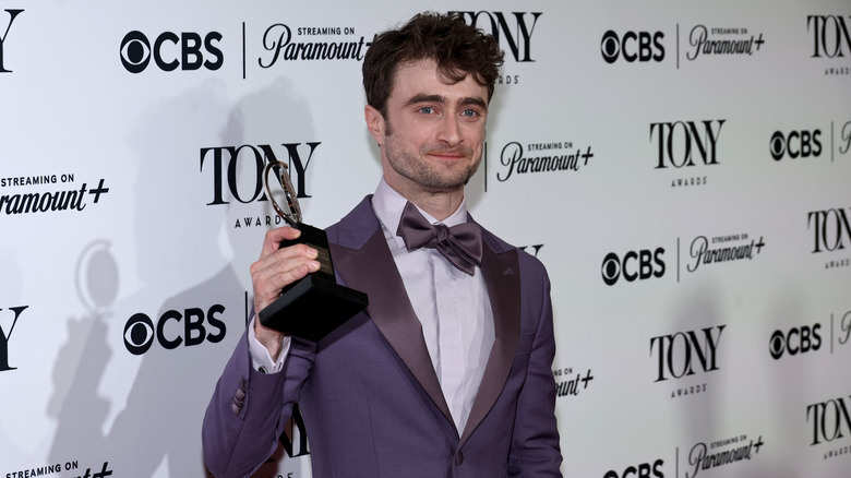 Daniel Radcliffe holding Tony