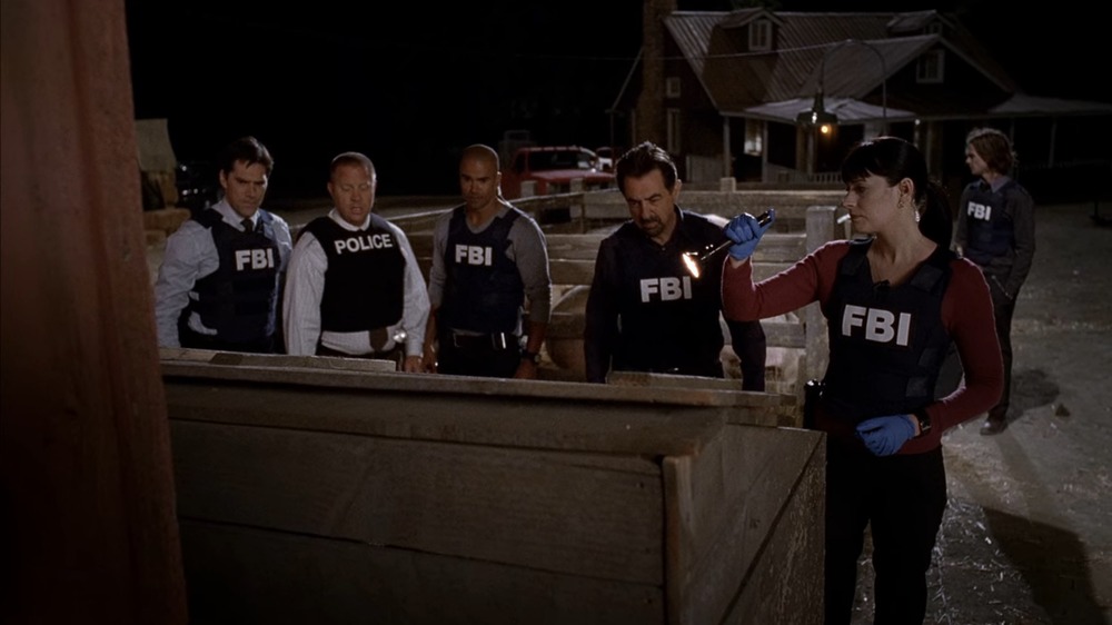 The Criminal Minds team at a pig farm