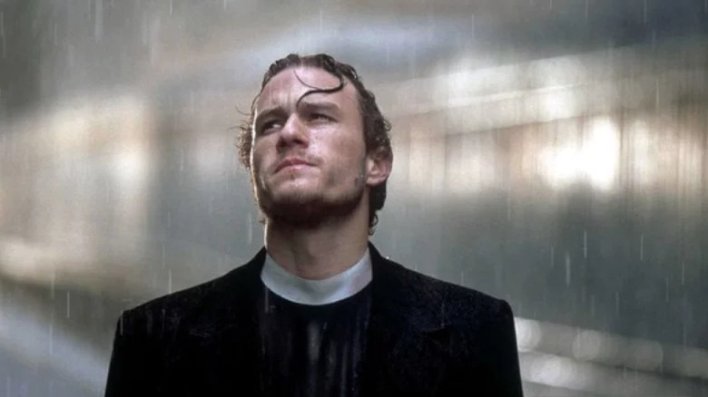 Ledger standing in rain 