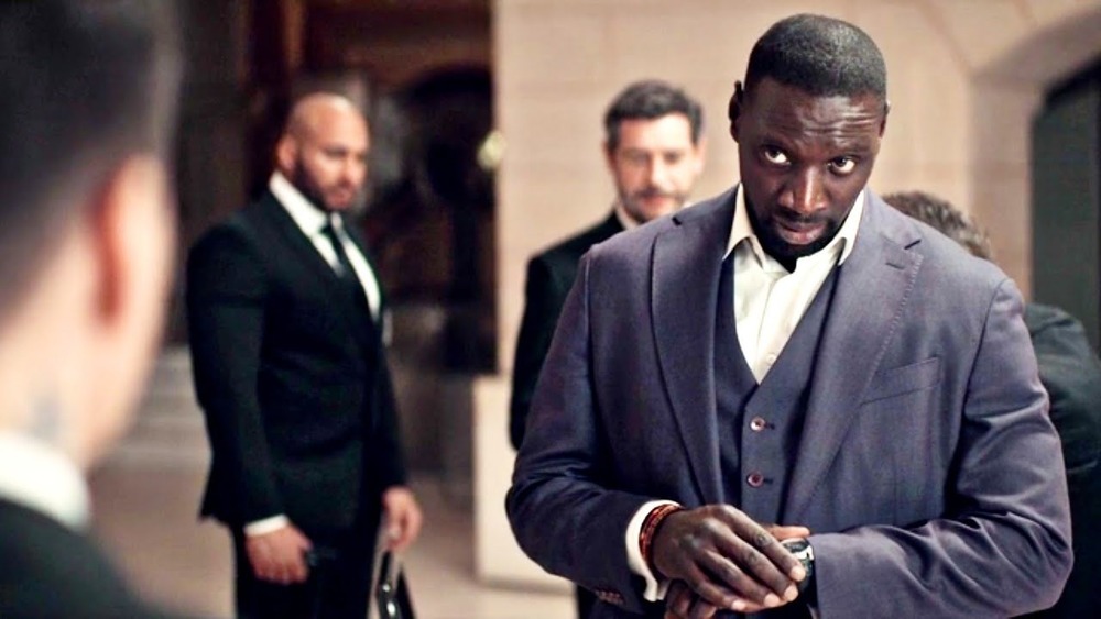 Omar Sy sizing up enemies