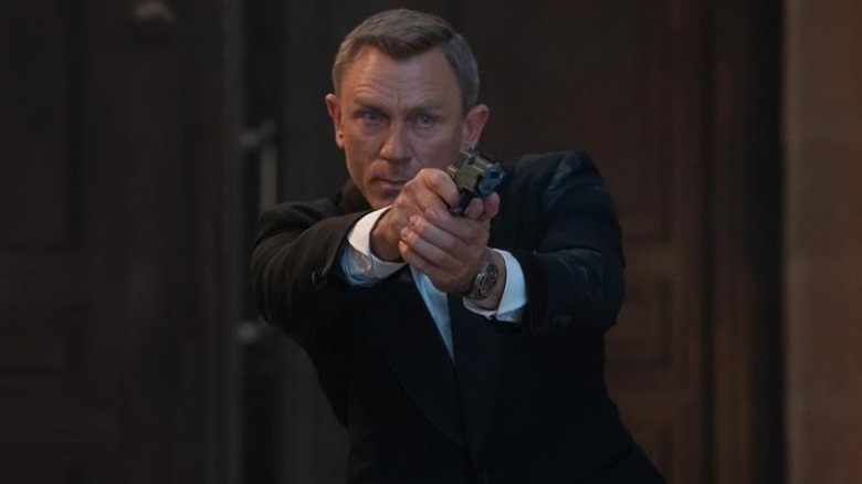 James Bond gun aiming intense