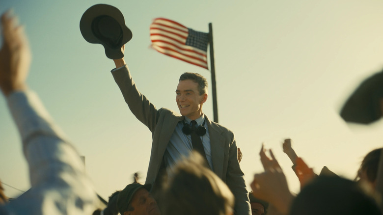 Oppenheimer waving to a crowd