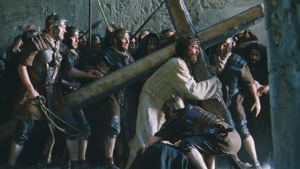 Christ carries the cross