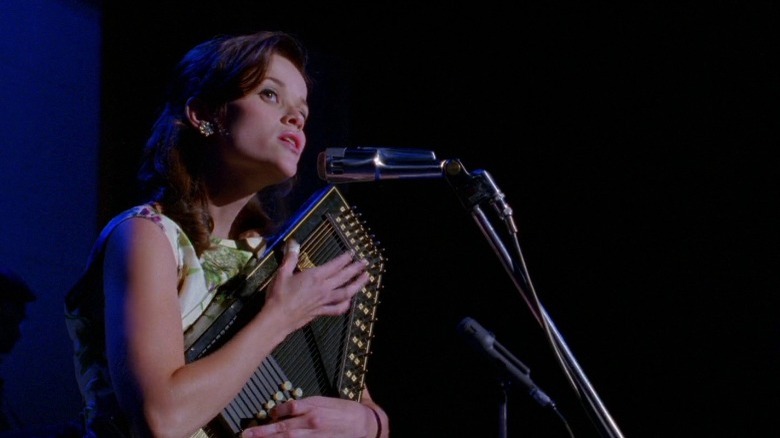 June Carter performs on stage