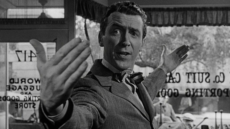 George Bailey arms wide