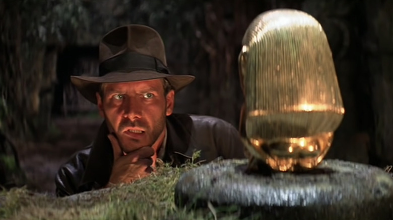 Indy looking at gold idol