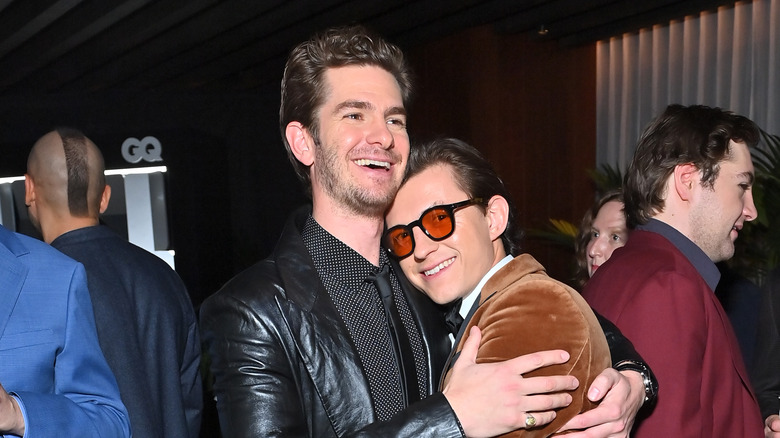 Andrew Garfield and Tom Holland hugging