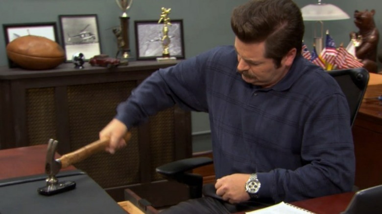 Ron Swanson smashing a phone