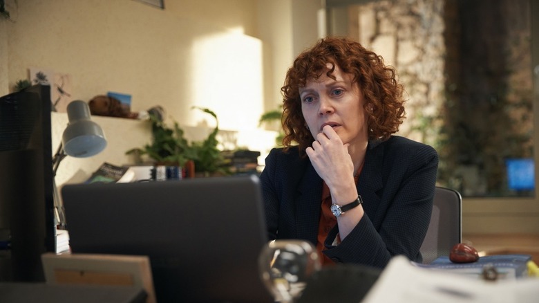 Mary Malone looking at laptop 