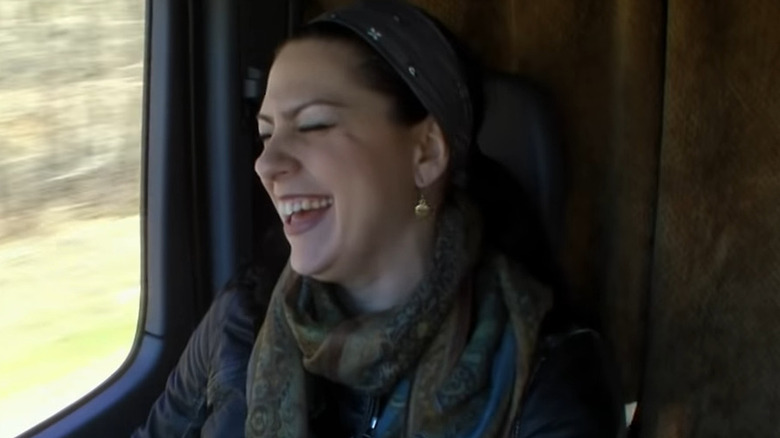 Danielle Colby laughing in the van