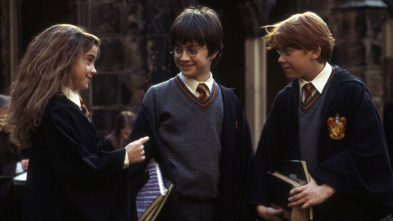 Hermione, Harry, and Ron in a Harry Potter movie