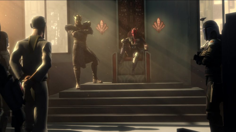 Maul sits on the throne of Mandalore, served by Prime Minister Almec and apprentice Savage Opress