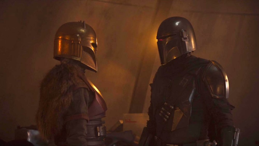 The Armorer and Din Djarin in the secret Mandalorian hideout on Nevarro