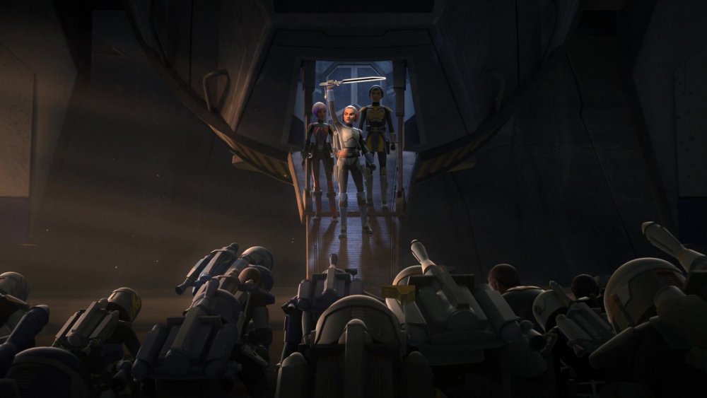 Bo-Katan Kryze, flanked by Sabine and Ursa Wren, accepts the role of leader of the Mandalorian warriors