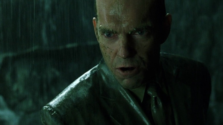 Agent Smith in rain no sunglasses