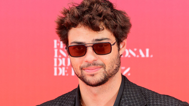 Noah Centineo wearing sunglasses