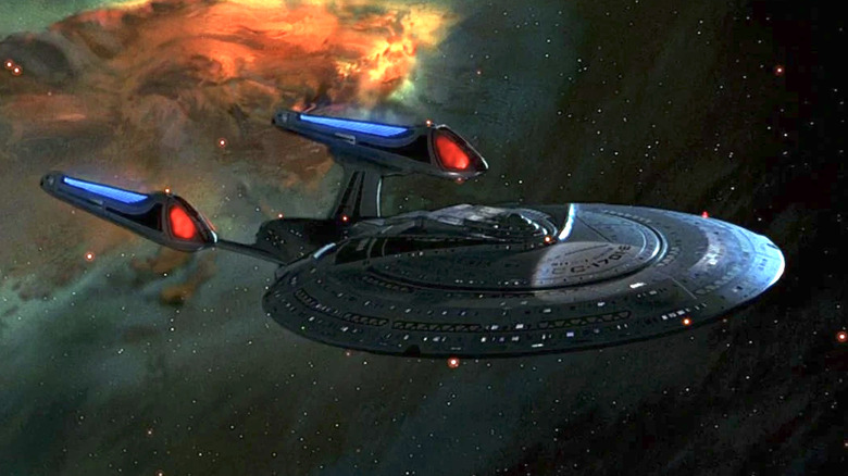 The Enterprise D flies through a nebula