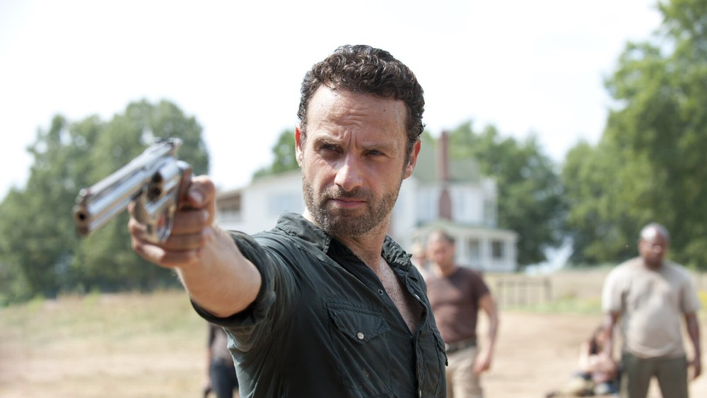 Rick Grimes pointing a stone-cold classic Colt Python