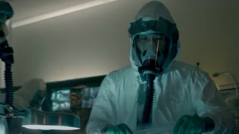 Man in biohazard suit in Hot Zone