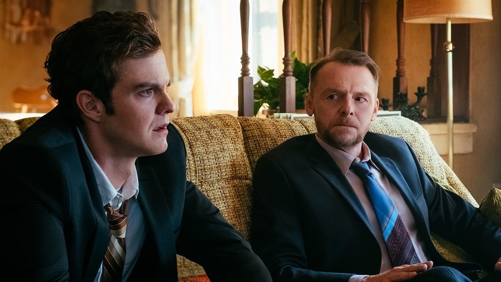 Hughie (Jack Quaid) and his dad (Simon Pegg) sit together after Robin's funeral on The Boys