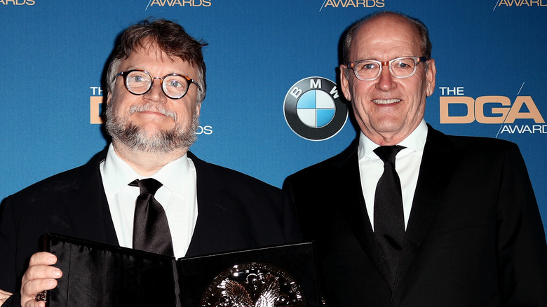 Jenkins presents award to del Toro