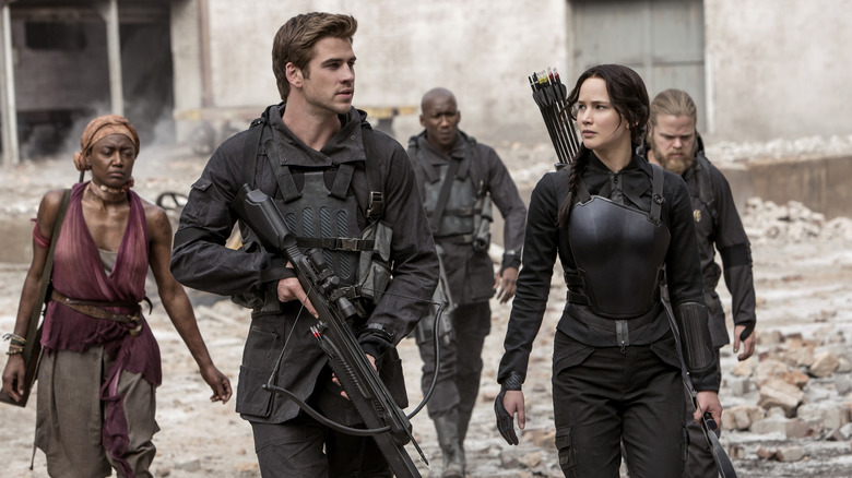 Katniss walking with Gale